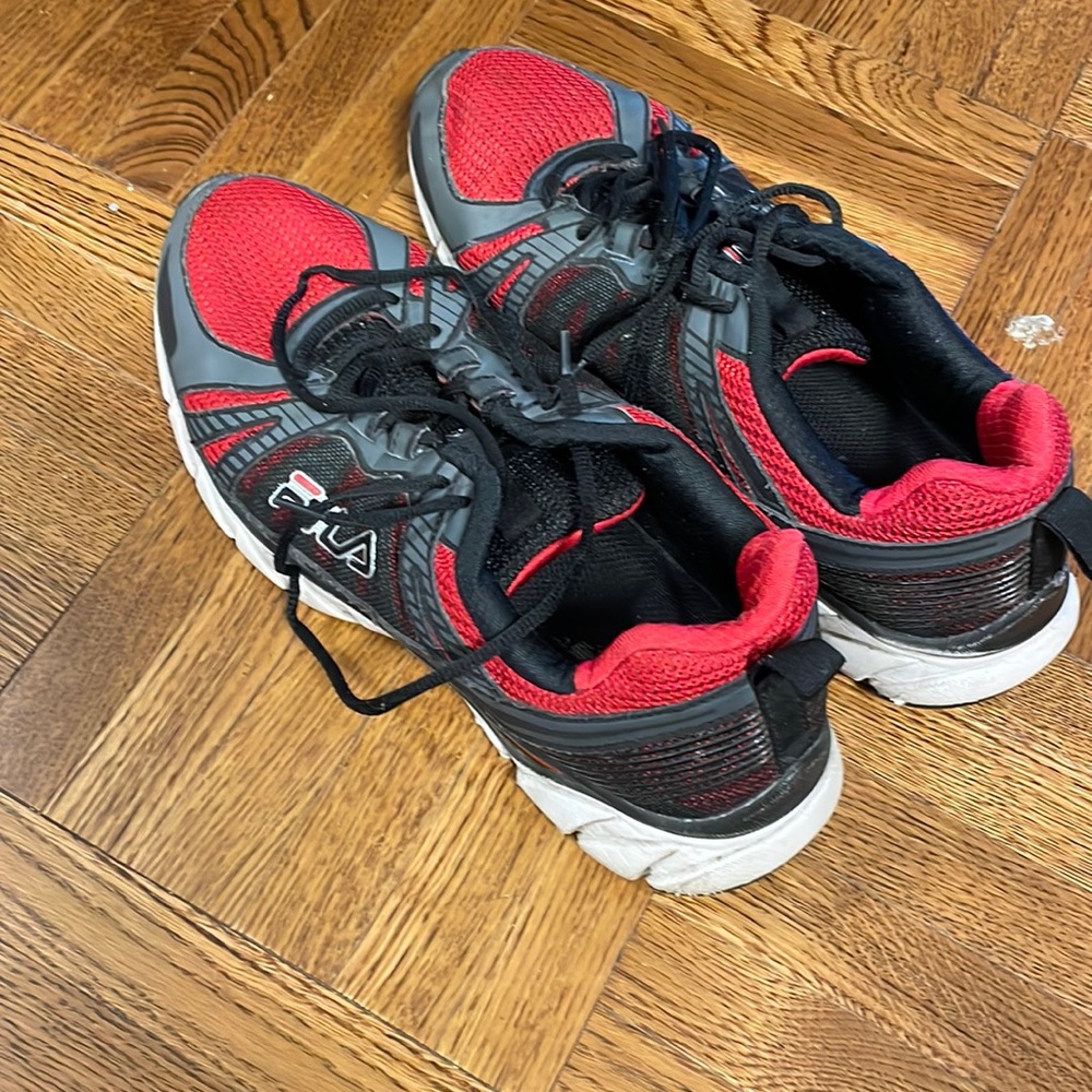 I’m selling Fila running shoes size 12.
